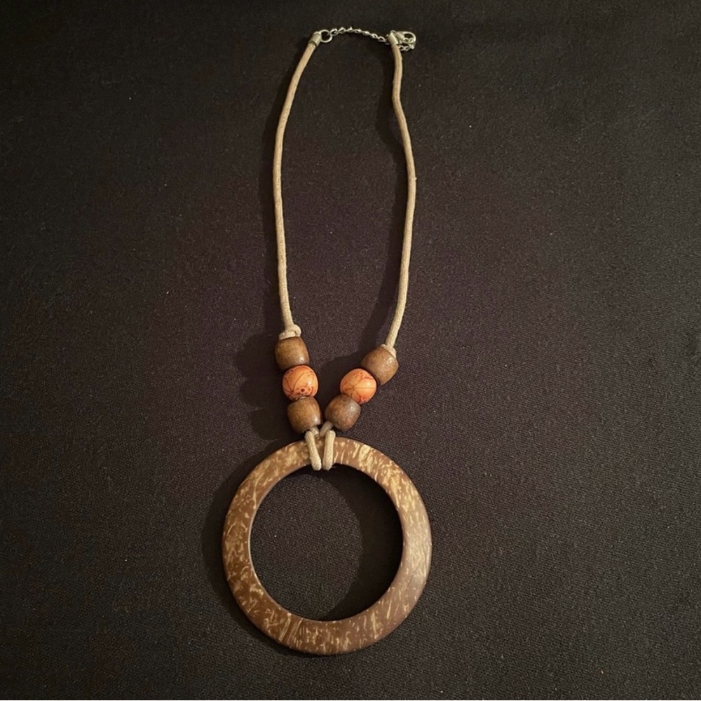 Open circle ornamental necklace with beads